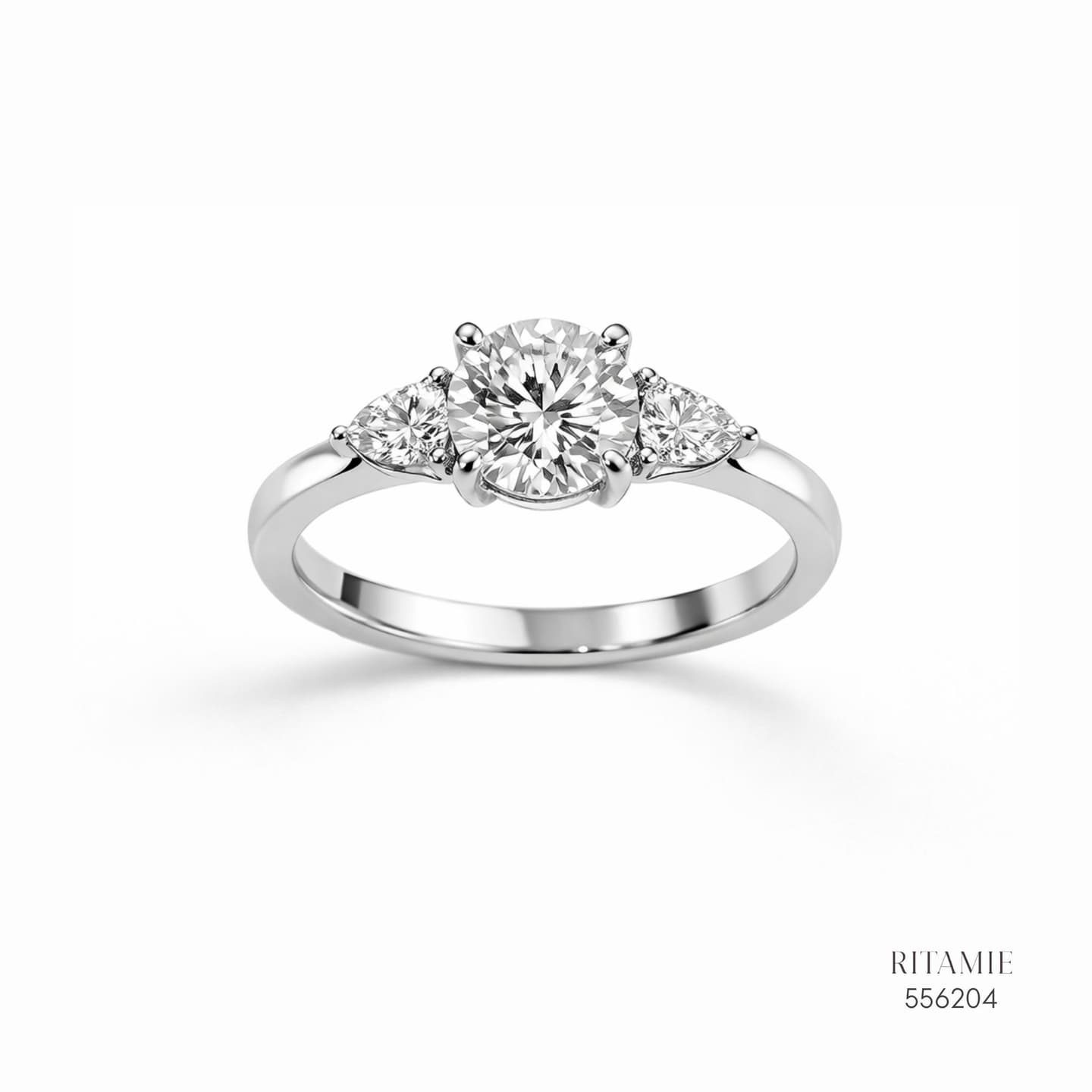 Pear-Accented Three-Stone Moissanite Silver Ring 556204