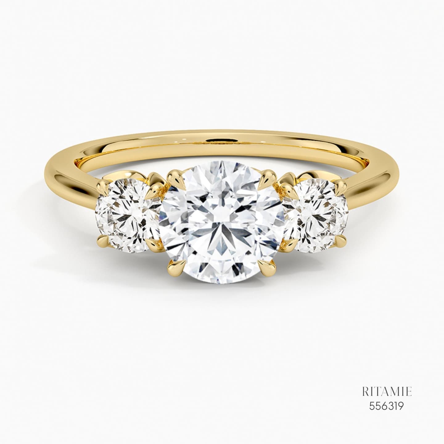 Three-Stone Pear &amp; Round Diamond Ring 556319