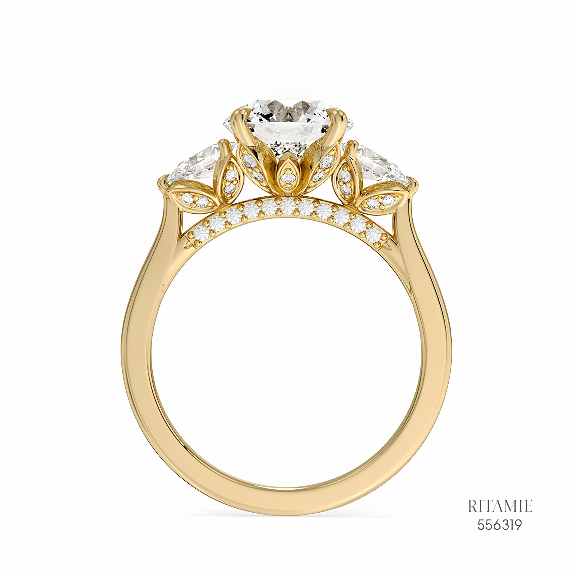 Three-Stone Pear & Round Diamond Ring 556319