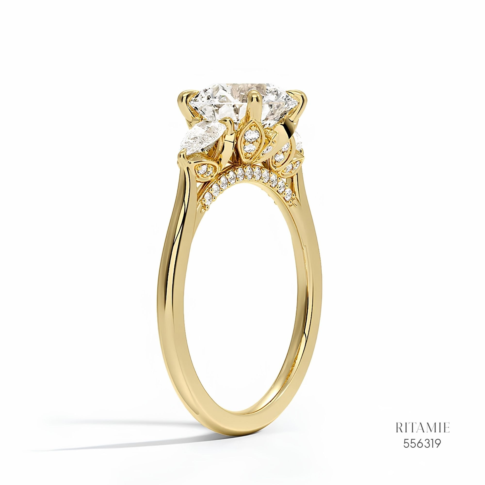 Three-Stone Pear & Round Diamond Ring 556319